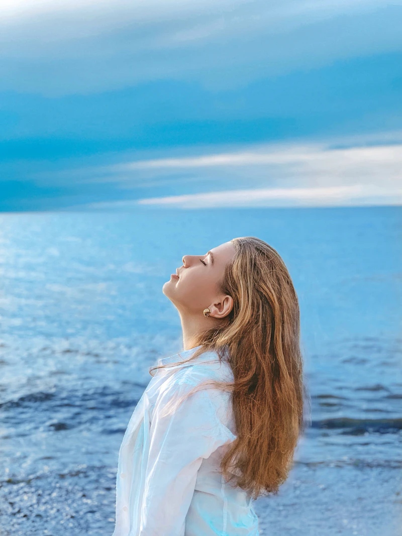 Close portrait of a woman with clear, hydrated skin after a skin treatment.